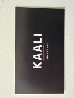 The printed Kaali Insurance card, photographed by the client